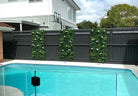 Small sample of Designer Plants USA Snowy White Vertical Garden with white flowers, showcasing artificial garden wall installation.