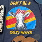 Heather midnight navy graphic T-shirt with "Don't Be A Salty Heifer" slogan from The Graphic Tee, casual short-sleeve tee.