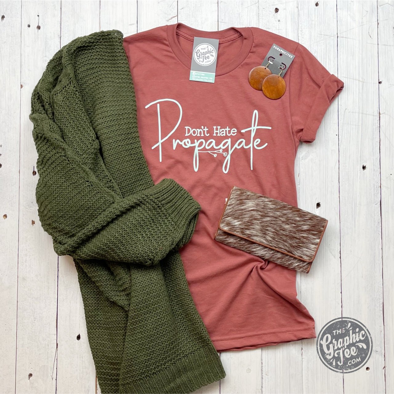 Don't Hate Propagate clay short sleeve graphic tee by The Graphic Tee featuring mint ink design on soft cotton fabric.
