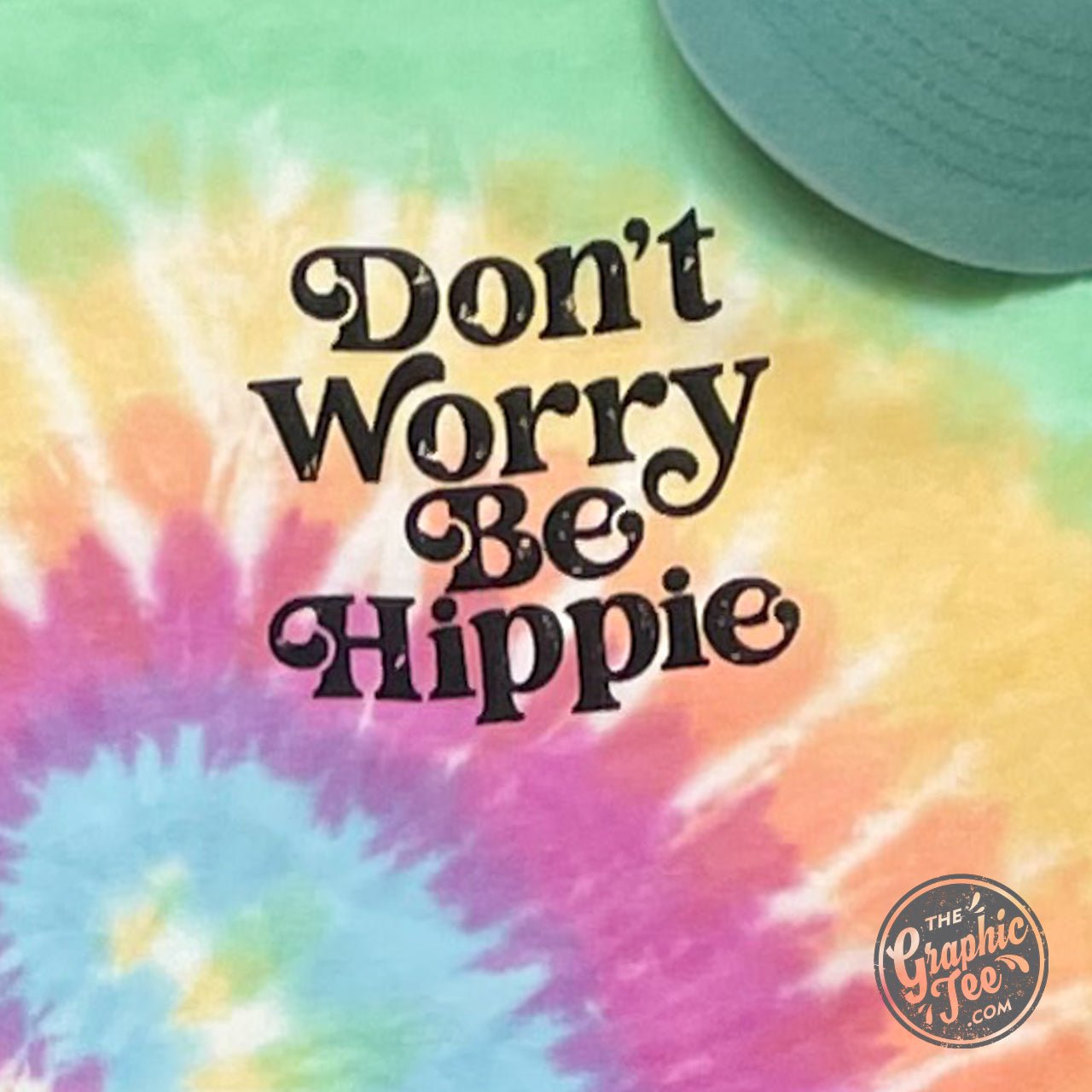 The Graphic Tee Don't Worry Be Hippie crew neck tie-dye short sleeve graphic t-shirt with colorful hippie design.