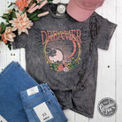 Dreamer Grey Mineral Wash Short Sleeve Crewneck Tee by The Graphic Tee, featuring a relaxed fit and casual graphic design.