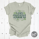 Easily Distracted By Gardens short sleeve graphic tee from The Graphic Tee, featuring a garden-themed design and casual fit.