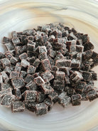 Elderberry Boost Gummies from Elderberry Boost, LLC, shown in a clear container with black elderberries and gummies visible.
