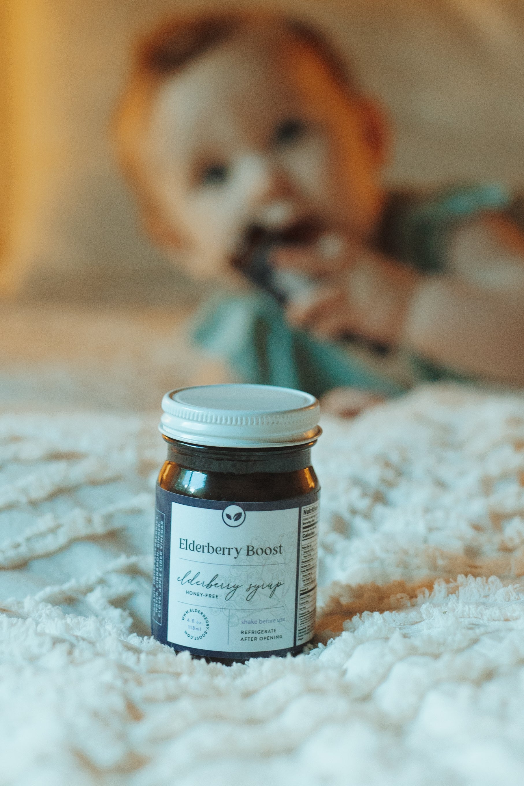 Elderberry Boost honey-free elderberry syrup in a 4 oz bottle, natural immune support supplement from Elderberry Boost LLC.