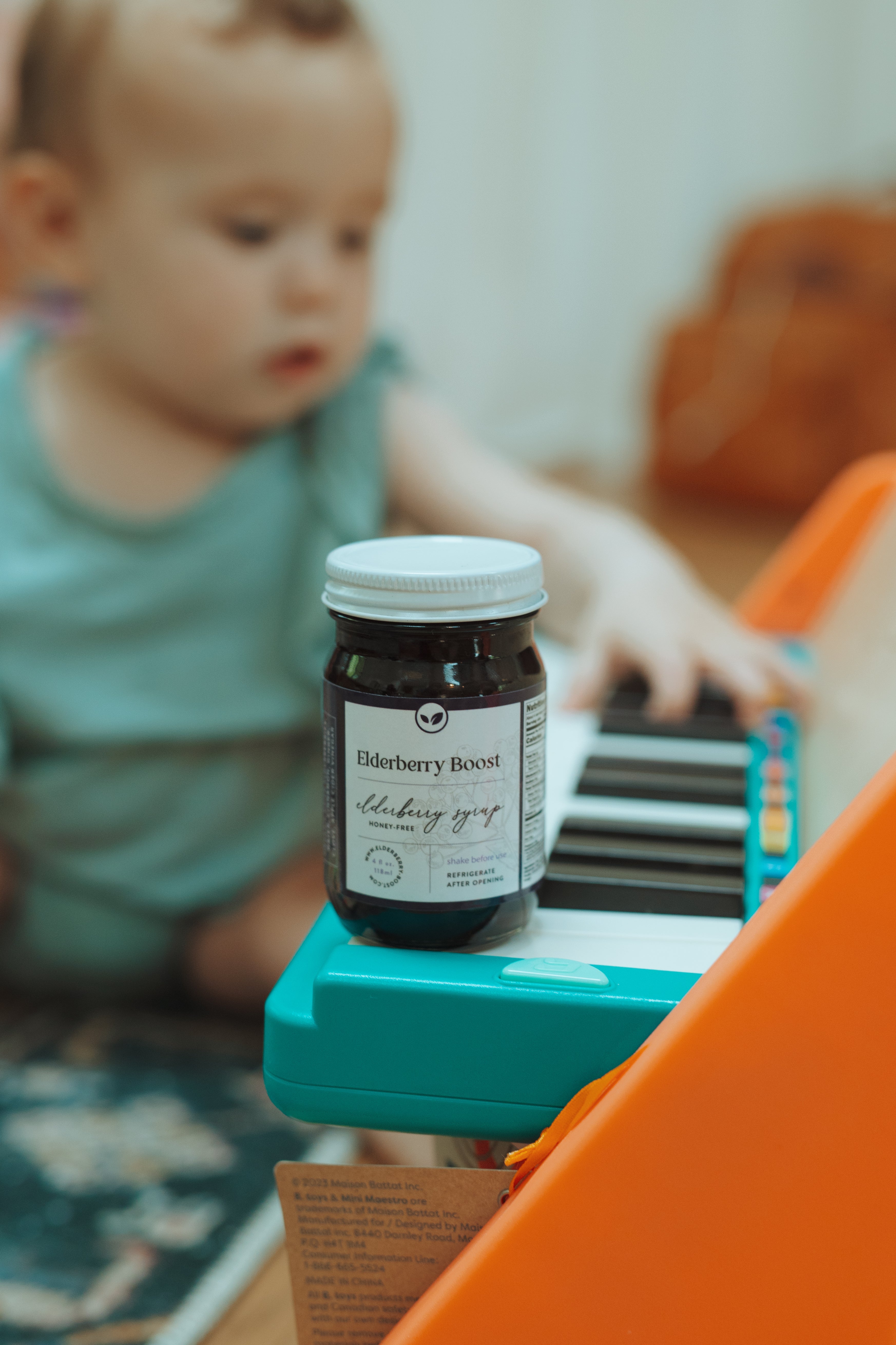 Elderberry Boost honey-free elderberry syrup in a 4 oz container, natural immune support supplement by Elderberry Boost, LLC.