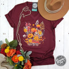 Fall Boho Floral Heather Cardinal short sleeve V-neck tee for women, featuring floral design and casual graphic style by The Graphic Tee