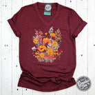 Fall boho floral Heather Cardinal V-neck short sleeve graphic tee from The Graphic Tee, featuring a vibrant floral design and casual fit.