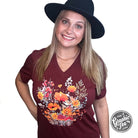 Fall boho floral Heather Cardinal V-neck short sleeve graphic tee by The Graphic Tee, featuring a floral design on a heather fabric.