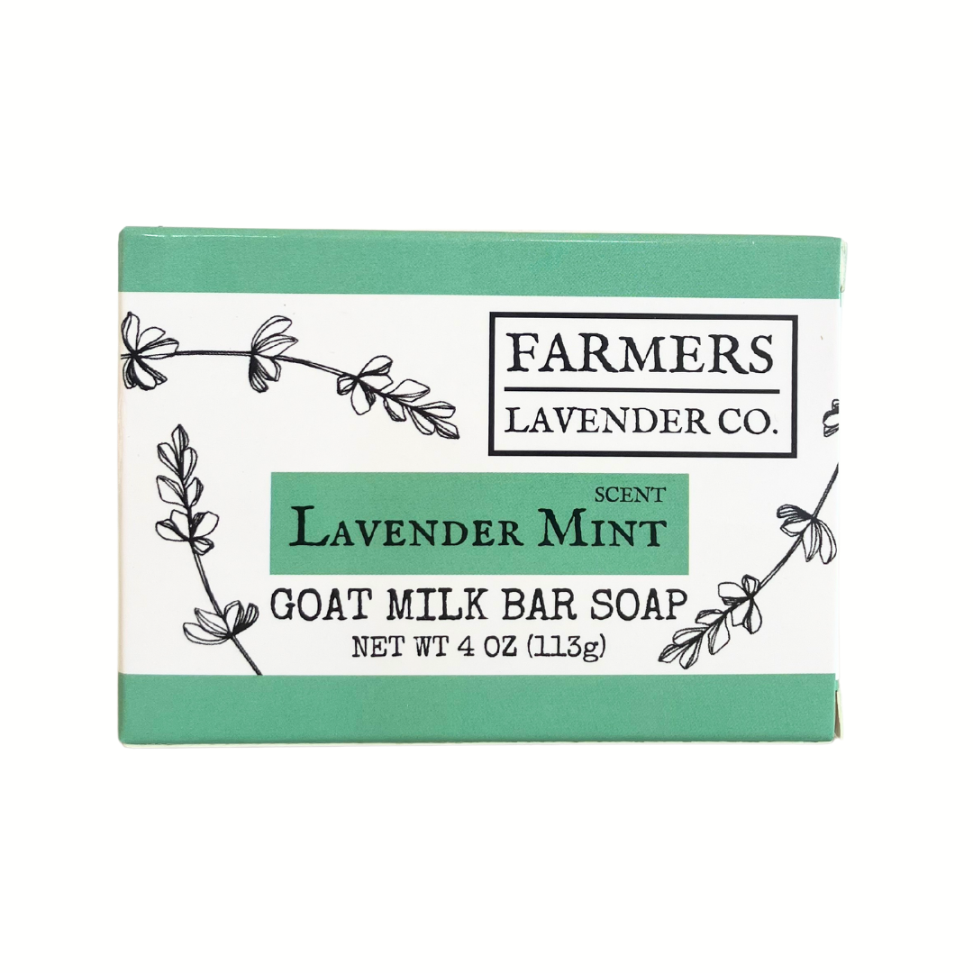 Lavender Mint Goat Milk Bar Soap by FARMERS Lavender Co. featuring a white soap bar with lavender and mint scent, wrapped in paper.