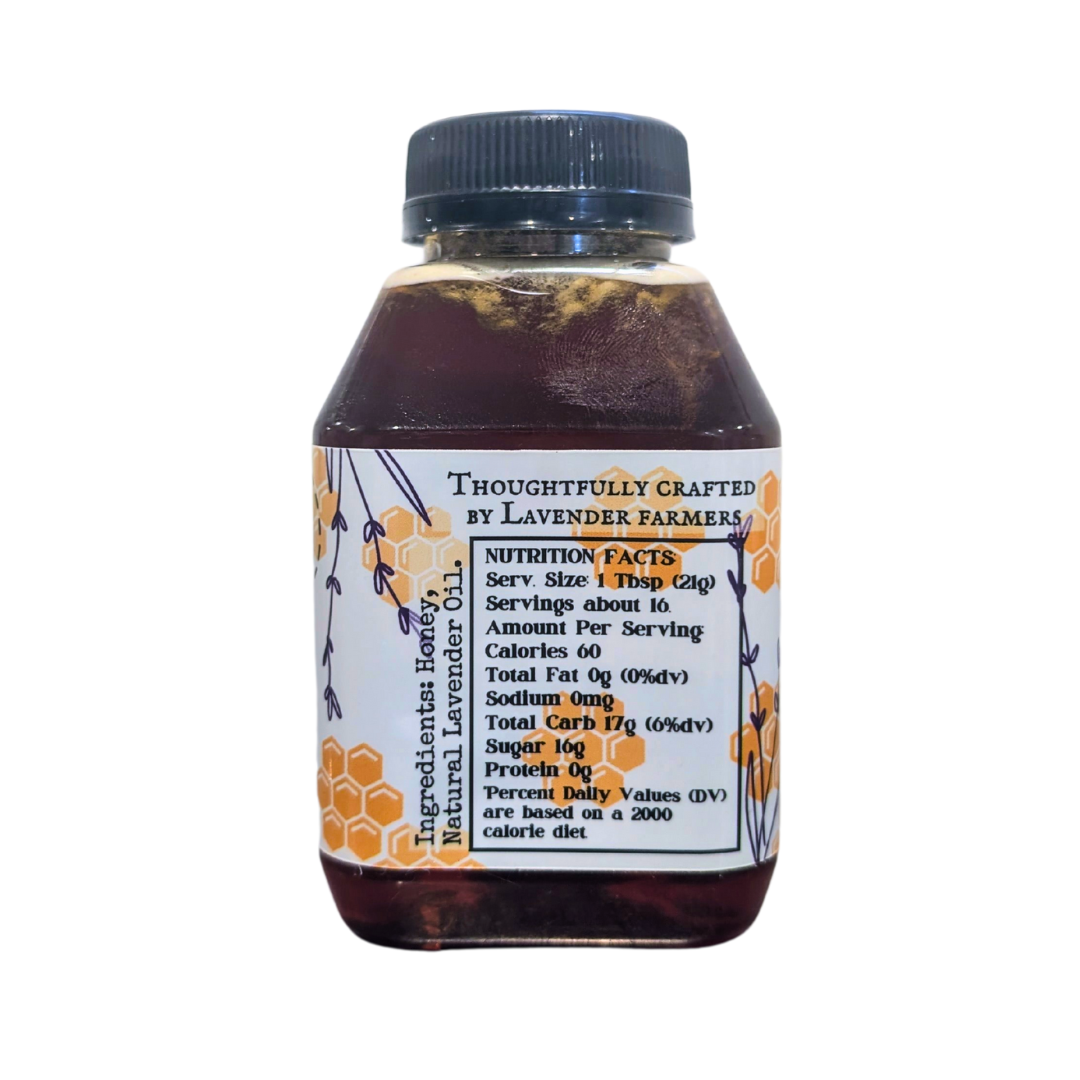 Jar of lavender-infused honey from FARMERS Lavender Co., showcasing a smooth, golden honey with lavender infusion visible.