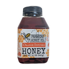 Jar of orange-infused honey from FARMERS Lavender Co., showcasing the smooth, amber honey infused with fresh orange flavor.