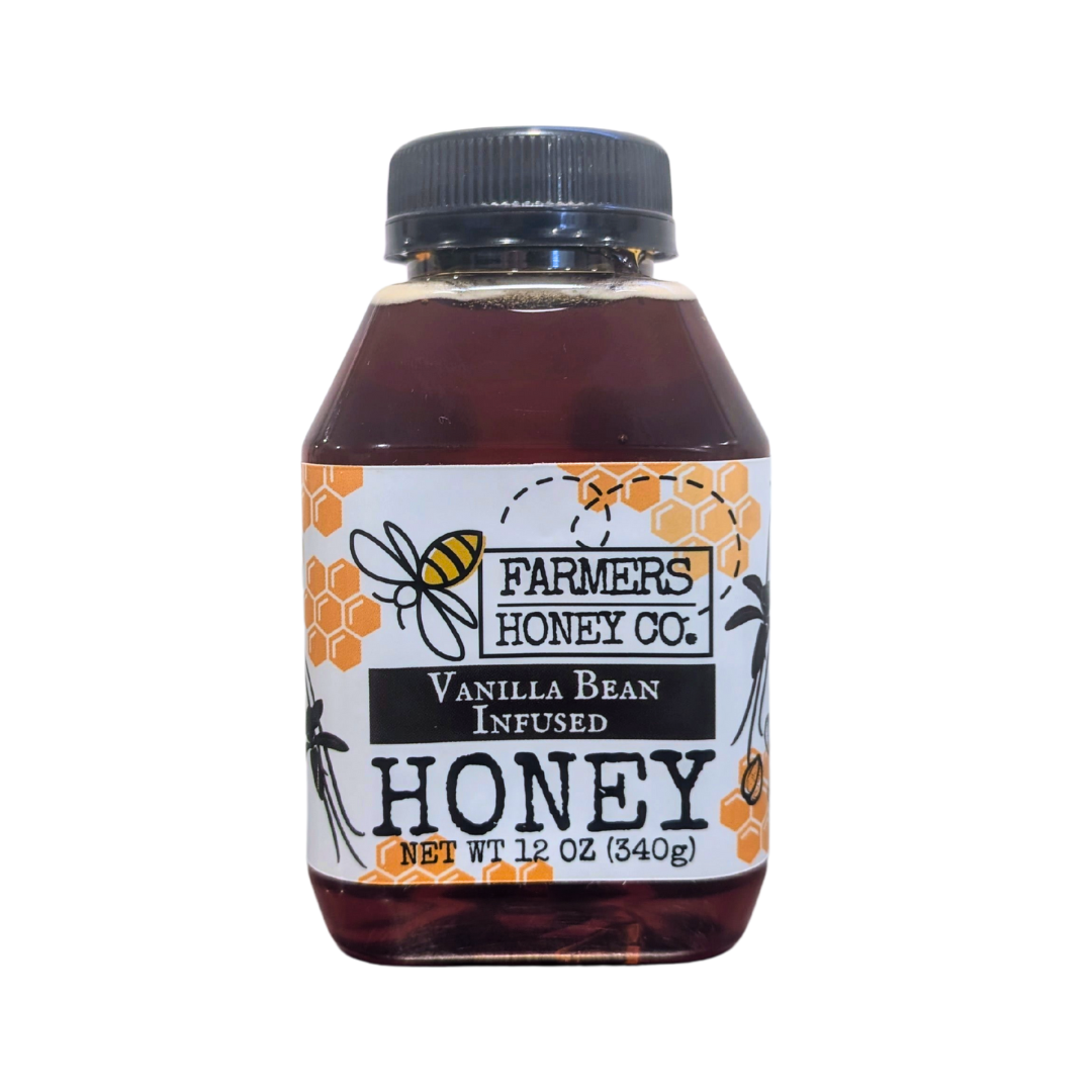 Vanilla bean infused honey from FARMERS Lavender Co., golden honey with vanilla bean pieces visible in a jar.