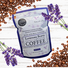 Ground lavender-infused coffee from FARMERS Lavender Co., showing a bag of Lavender Blend Coffee with lavender flowers.