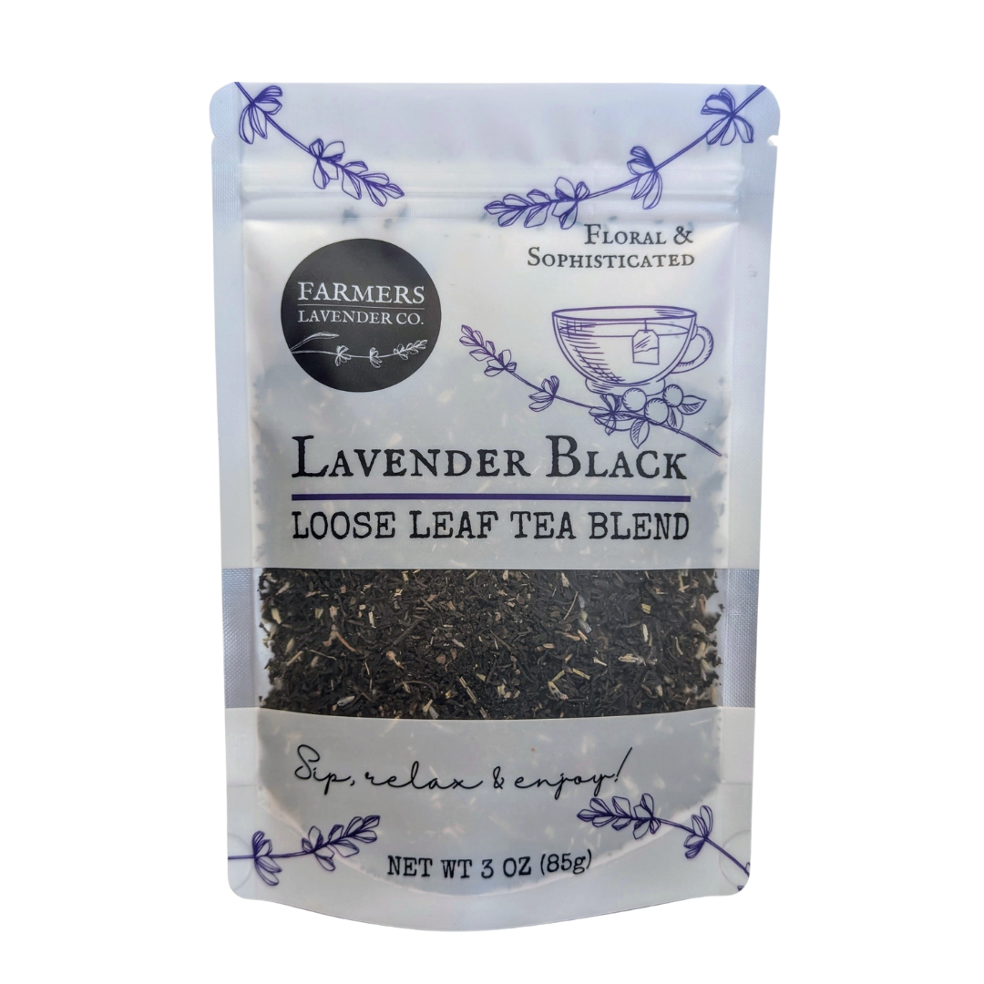 Lavender Black Loose Leaf Tea Blend from FARMERS Lavender Co., showing dark tea leaves with lavender flower accents.