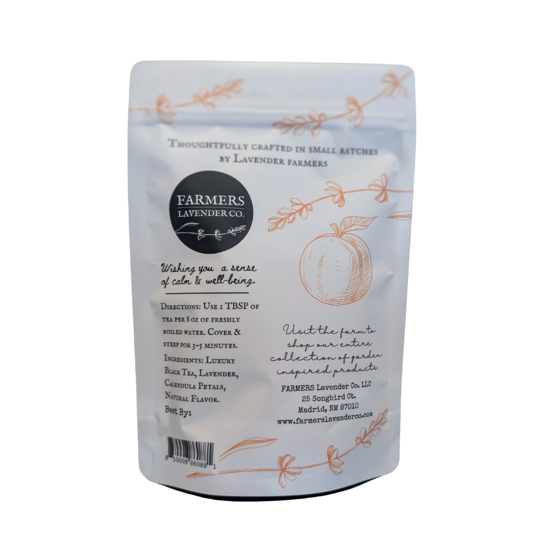 Loose leaf Lavender Peach tea blend from FARMERS Lavender Co., showing dried lavender and peach-infused tea leaves.