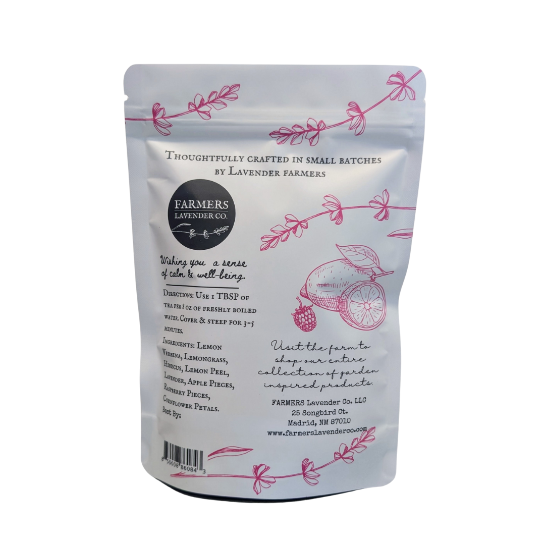 Loose leaf Lavender Relaxation Tea by FARMERS Lavender Co., showing fresh lavender-infused tea leaves in a clear jar.