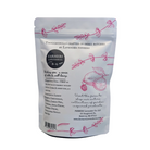 Loose leaf Lavender Relaxation Tea by FARMERS Lavender Co., showing fresh lavender-infused tea leaves in a clear jar.