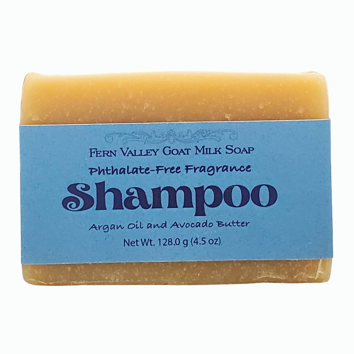 Handmade Fern Valley Goat Milk Shampoo Bar with argan oil and avocado butter, designed for men, shown in a natural soap display.