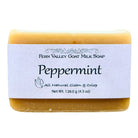 Handmade Fern Valley goat milk soap with natural peppermint scent, showing a bar of soap with peppermint leaves and packaging.