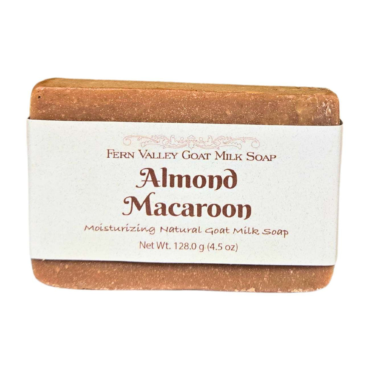 Handmade Fern Valley Goat Milk Soap with almond macaroon scent, creamy soap bar with almond and caramel accents on a natural background.