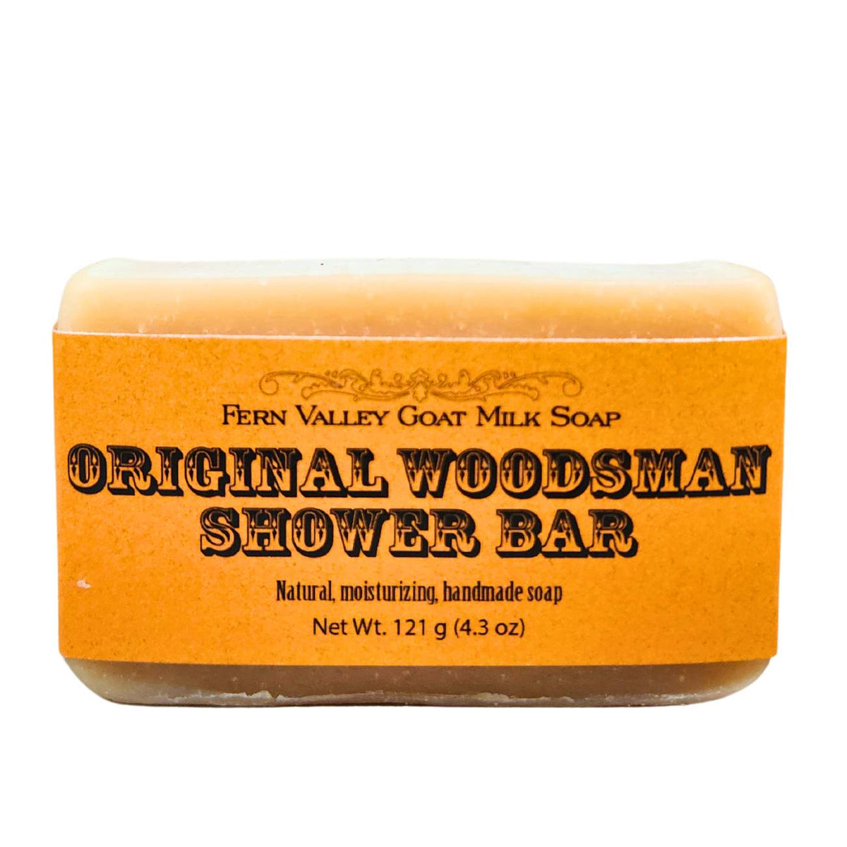 Handmade Fern Valley Goat Milk Soap shower bar with rustic wooden packaging and natural earthy tones.