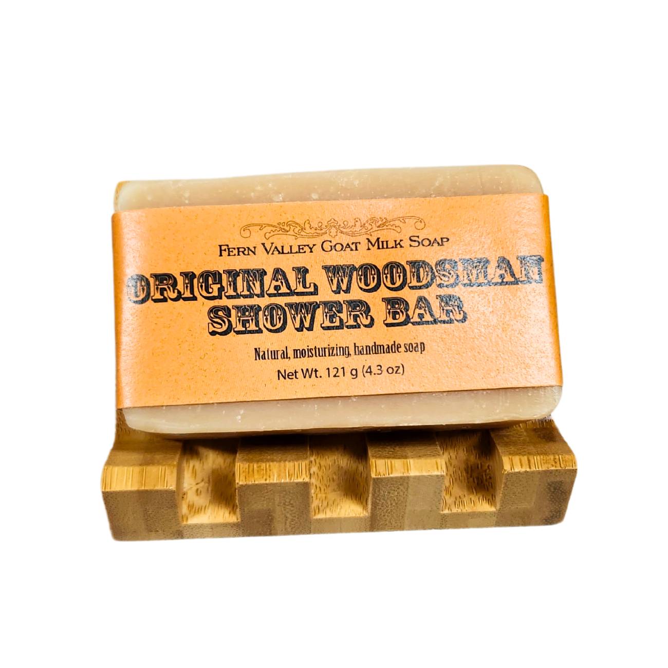 Handmade Fern Valley Goat Milk Soap shower bar with rustic wood packaging, showcasing natural ingredients and artisanal craftsmanship.