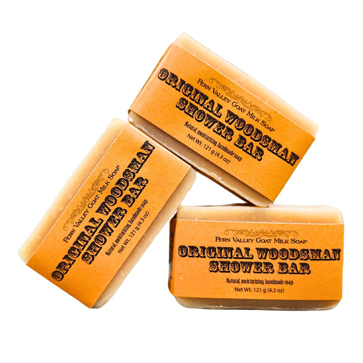 Fern Valley Soap handmade goat milk shower bar labeled Original Woodsman, showcasing rustic packaging and natural soap texture.