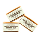 Handmade Fern Valley Goat Milk Soap shower bar with spiced mahogany scent, featuring a textured dark brown surface.