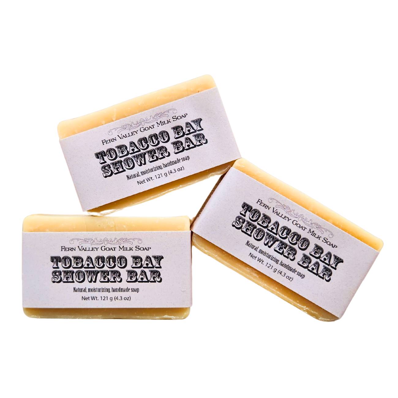 Handmade Fern Valley Goat Milk Soap shower bar with tobacco bay scent, featuring a natural, rustic packaging and creamy soap texture.