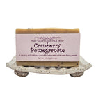 Fern Valley Goat Milk Soap with cranberry pomegranate exfoliating scrub, showcasing a vibrant, textured soap bar with fresh fruit accents.