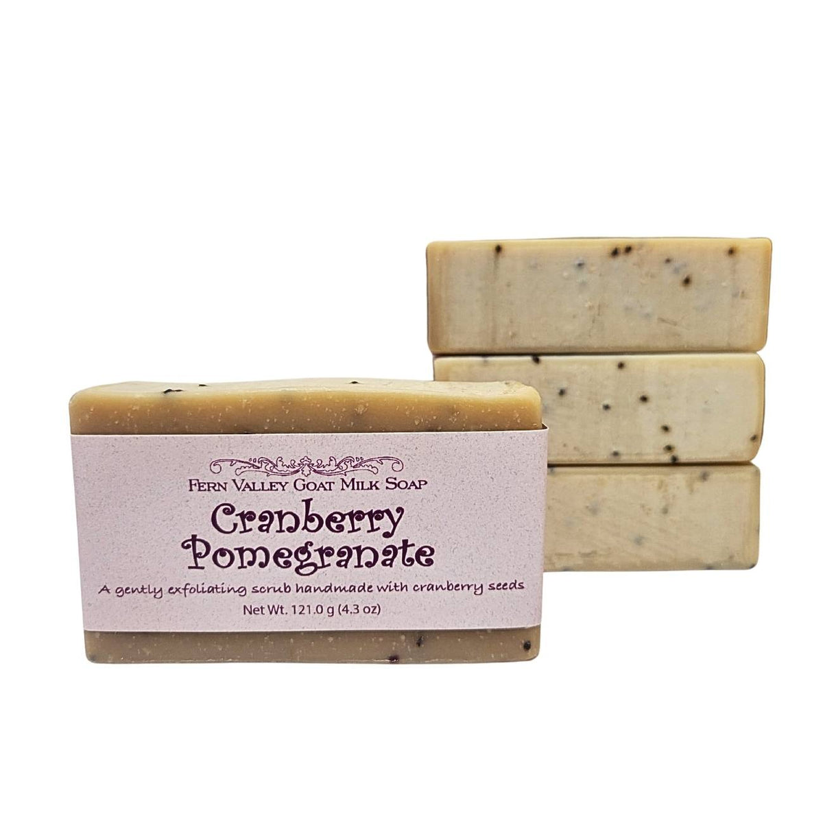 Fern Valley Goat Milk Soap with cranberry and pomegranate exfoliating scrub, showing the textured soap bar with vibrant fruit accents.