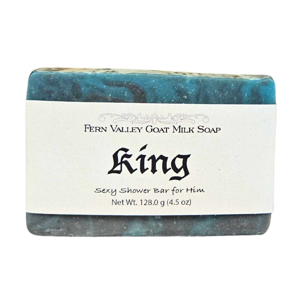 Fern Valley Soap King exfoliating goat milk soap bar with sexy cologne scent, showing textured surface and elegant packaging.