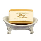 Oatmeal and honey exfoliating goat milk soap bar by Fern Valley Soap, with natural ingredients and textured surface.