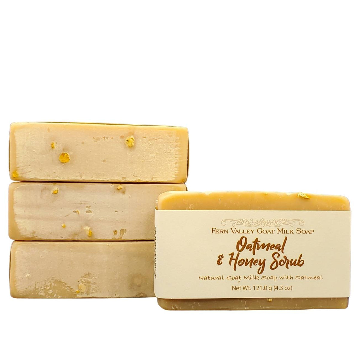 Fern Valley Goat Milk Soap with oatmeal and honey, exfoliating scrub bar showing textured oatmeal and honey ingredients.