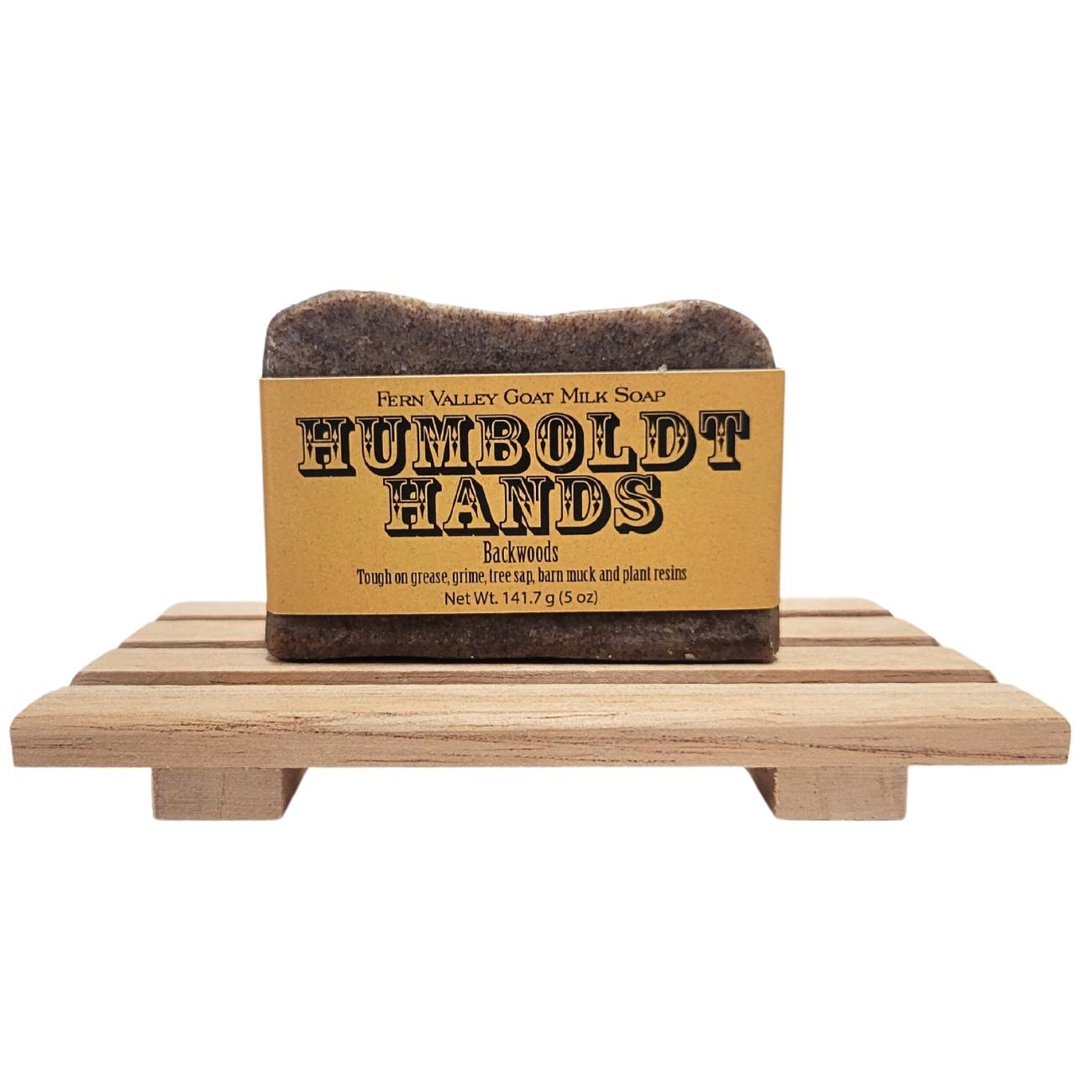 Fern Valley Soap natural goat milk soap bar, Humboldt Hands heavy-duty hand cleaner with backwoods scent, in a rustic packaging.