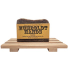Fern Valley Soap natural goat milk soap bar, Humboldt Hands heavy-duty hand cleaner with backwoods scent, in a rustic packaging.