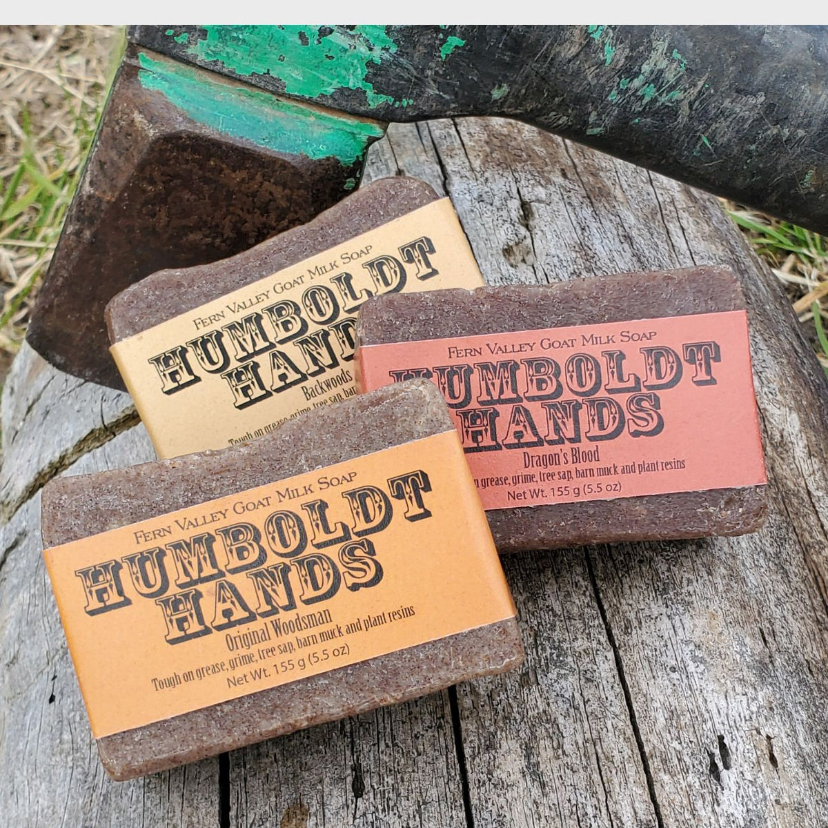 Fern Valley Soap's natural goat milk soap with dragon's blood, shown in a rustic setting, highlighting its creamy texture and herbal ingredients.