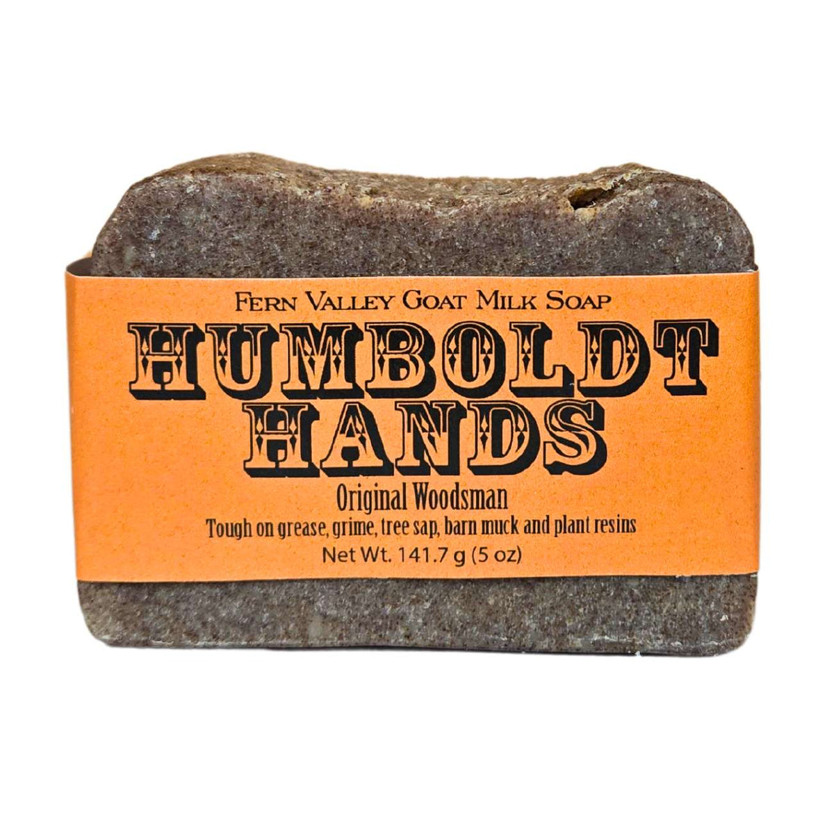 Fern Valley Soap's Natural Goat Milk Soap, Original Woodsman scent, featuring rustic packaging and creamy soap bar with natural ingredients.
