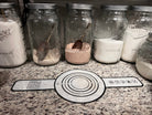 Five Oaks Farm Dough Sling for bread baking, showing the flexible, durable silicone sling with handles on a wooden surface.