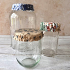 Set of Five Oaks Farm from-the-farm autumn mushroom jar covers featuring tiny mushroom illustrations for preserving jars.