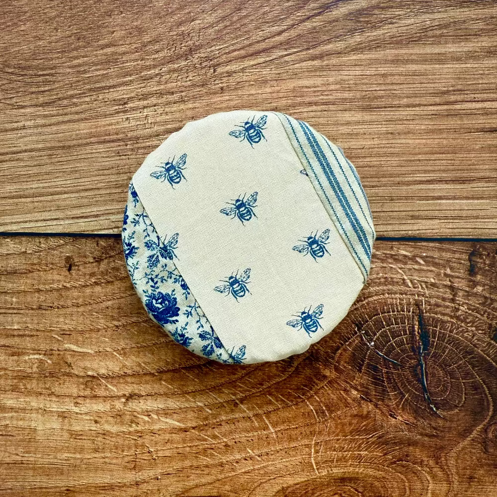 Tiny mushroom jar covers from Five Oaks Farm's From the Farm collection, featuring autumn-themed mushroom designs.