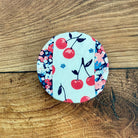 Farmhouse jar covers from Five Oaks Farm, rustic fabric lids with ties, ideal for preserving and decorating jars.