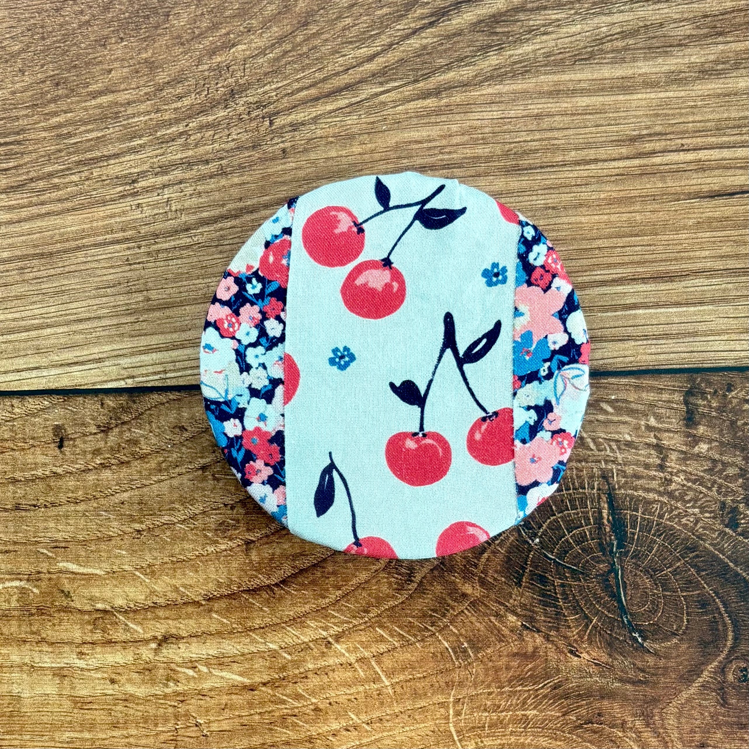 Farmhouse jar covers from Five Oaks Farm, rustic fabric lids with ties, ideal for preserving and decorating jars.