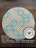 Large mushroom-shaped bowl covers from Five Oaks Farm, perfect for keeping food fresh in rustic kitchen settings.