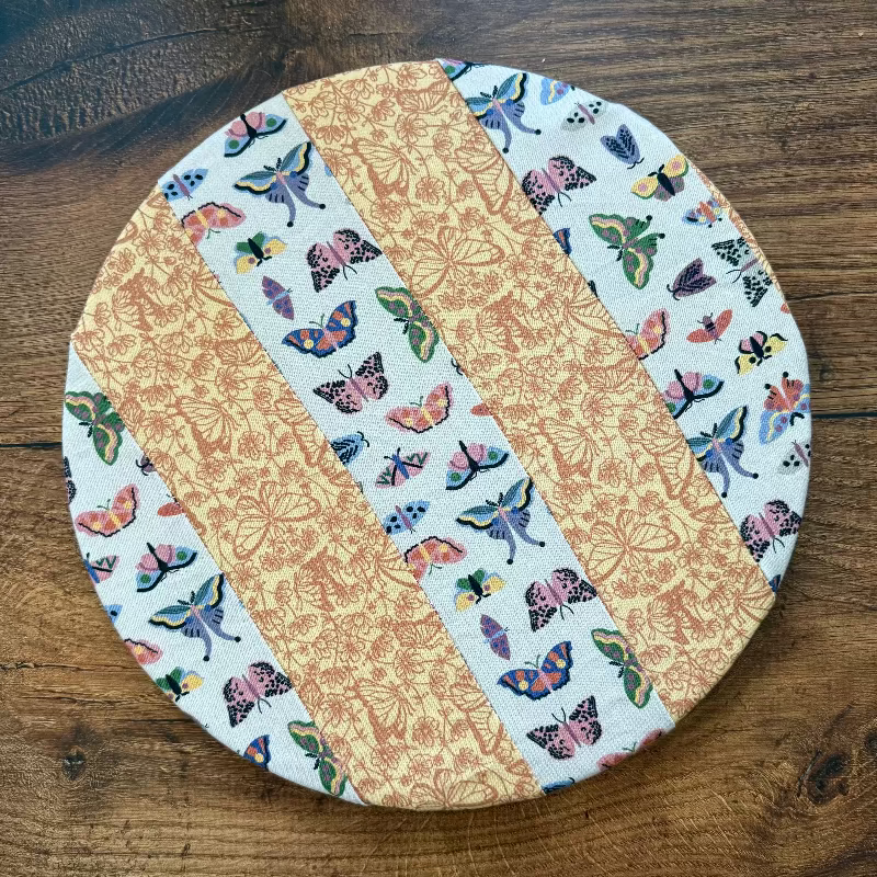 Medium bowl and banneton covers from Five Oaks Farm featuring autumn mushroom and tiny mushroom designs on natural fabric.