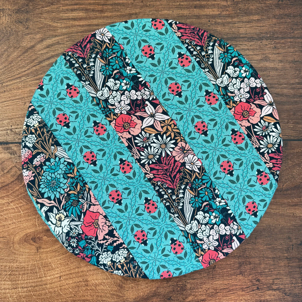 Medium bowl and banneton covers from Five Oaks Farm, featuring autumn mushroom and tiny mushroom designs, for bread proofing.