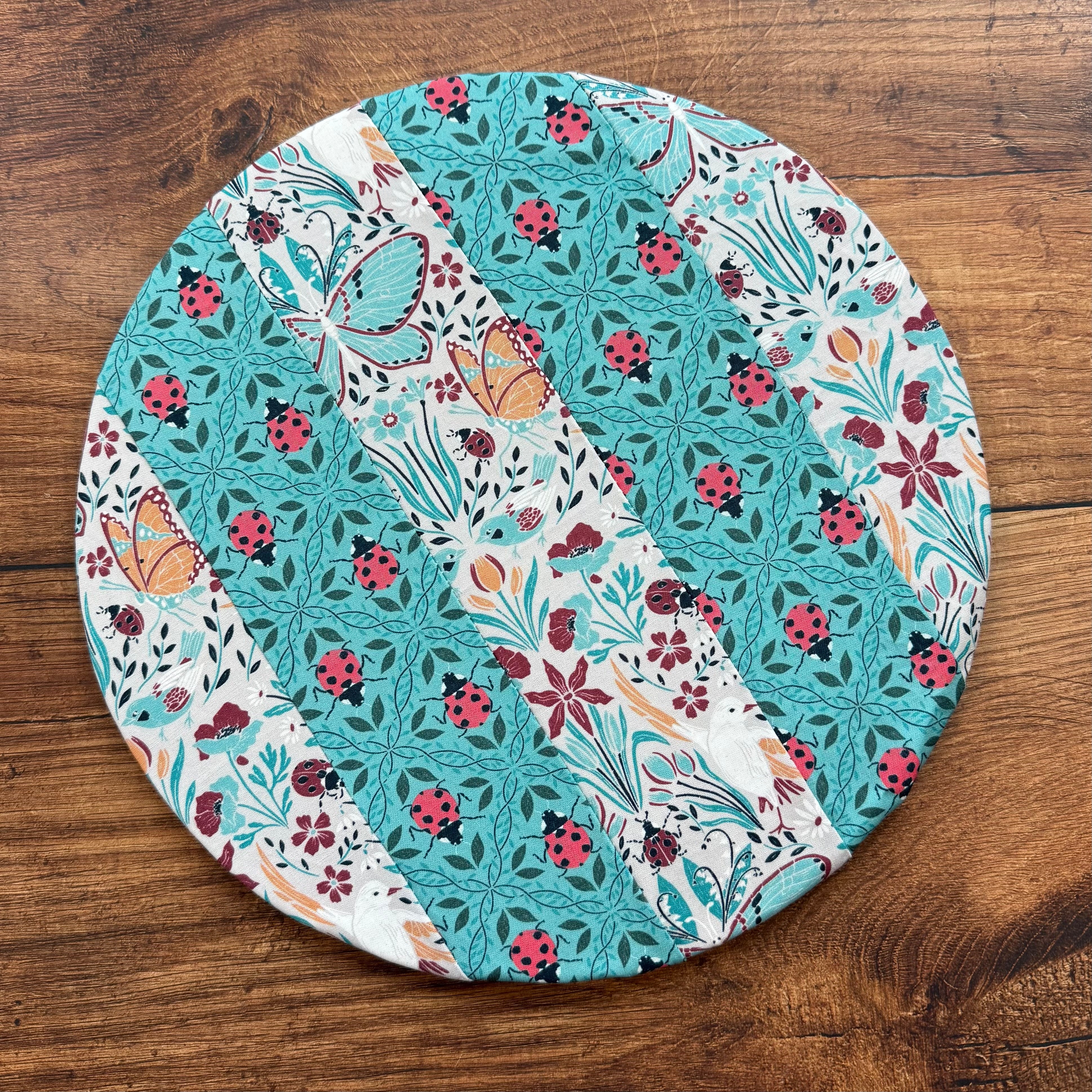 Medium bowl and banneton covers from Five Oaks Farm, featuring autumn mushroom designs for bread baking and fermentation.