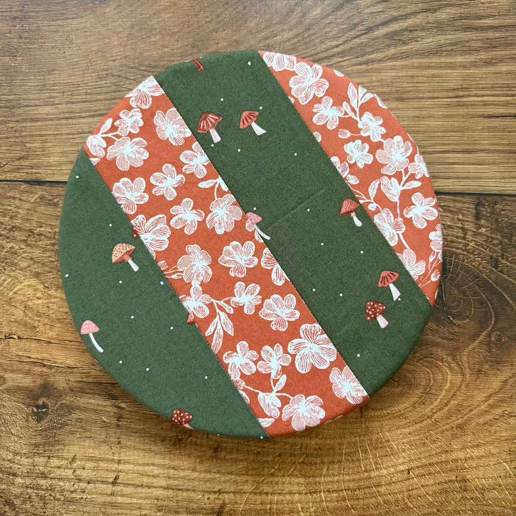 Small bowl and banneton covers from Five Oaks Farm, featuring autumn mushroom design for bread proofing and serving.
