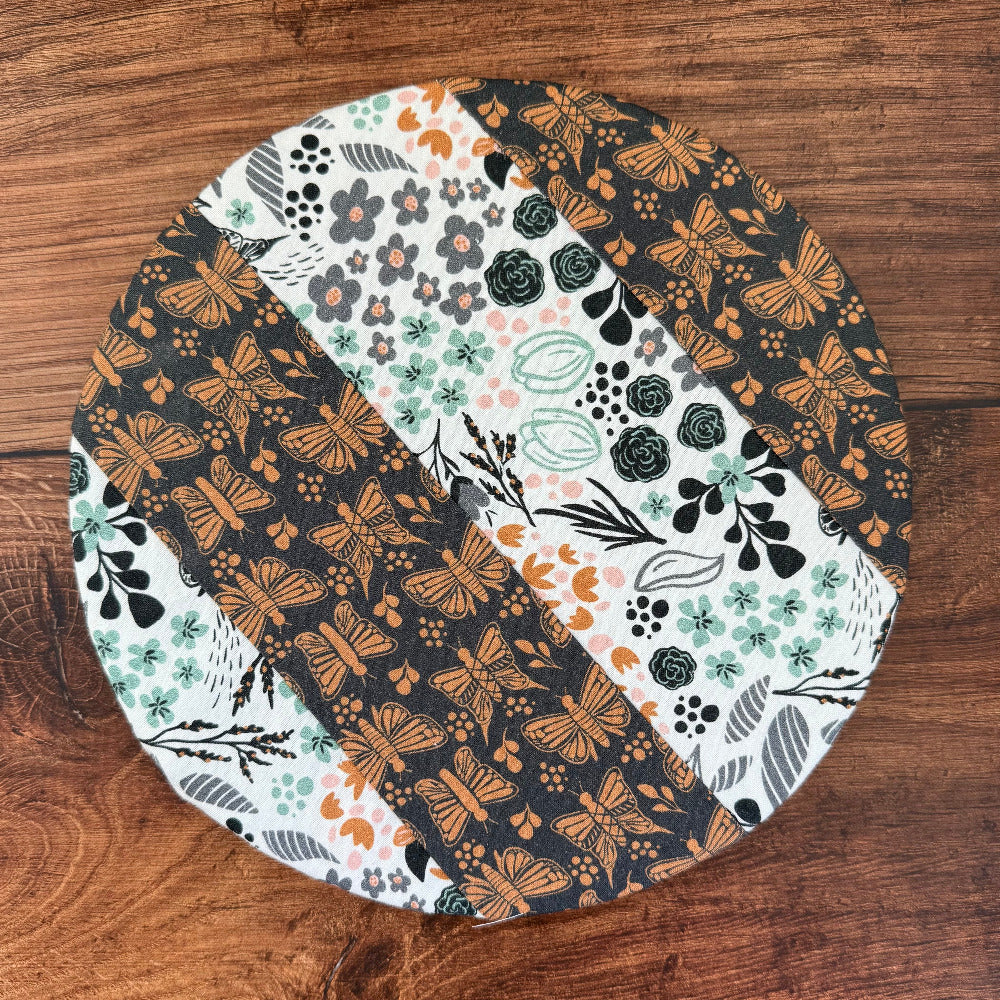 Small bowl and banneton covers from Five Oaks Farm, featuring autumn mushroom designs on natural fabric.