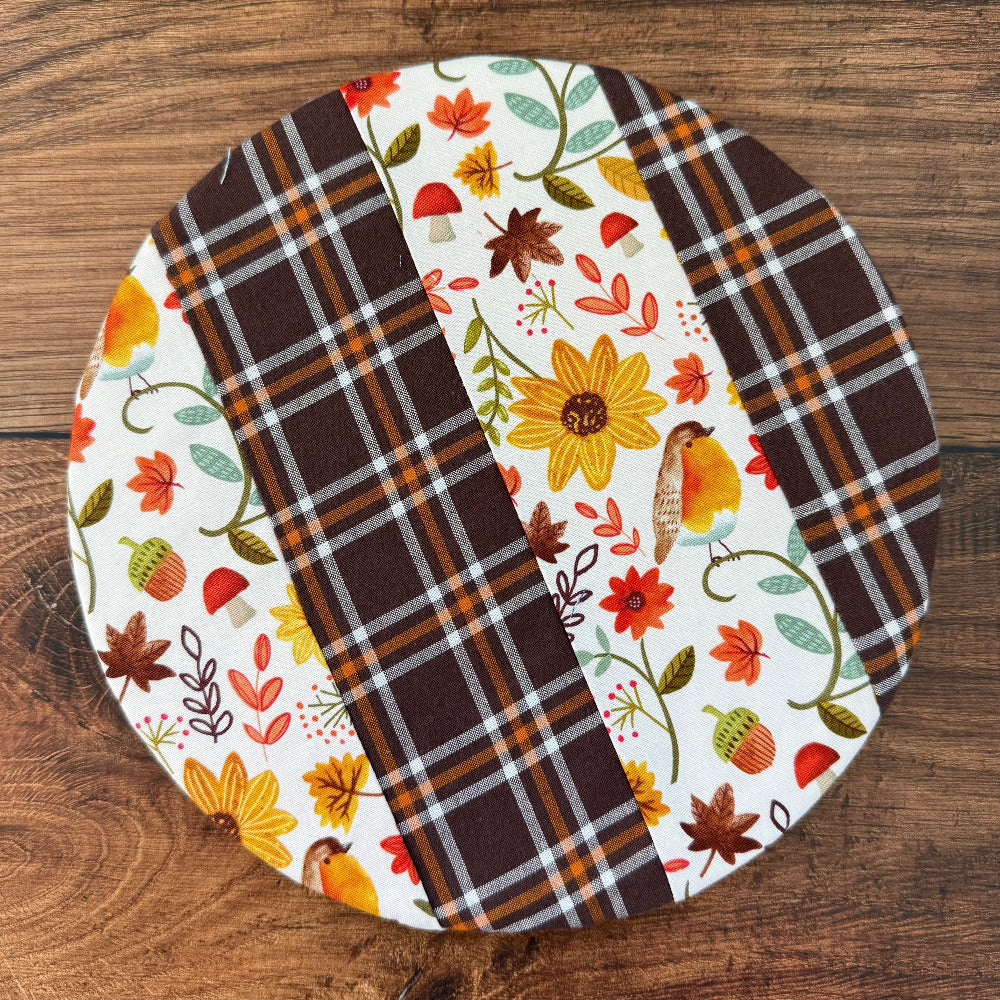 Small bowl and banneton covers from Five Oaks Farm, featuring autumn mushroom and tiny mushroom designs, used for bread proofing.